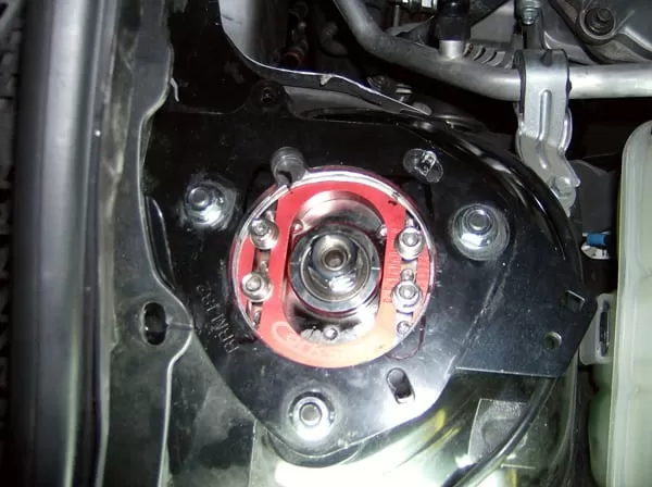 Some custom work is required to have the ability to adjust the camber on your Mazda 3/Mazdaspeed 3 while the camber plate is install.  See the instructions.