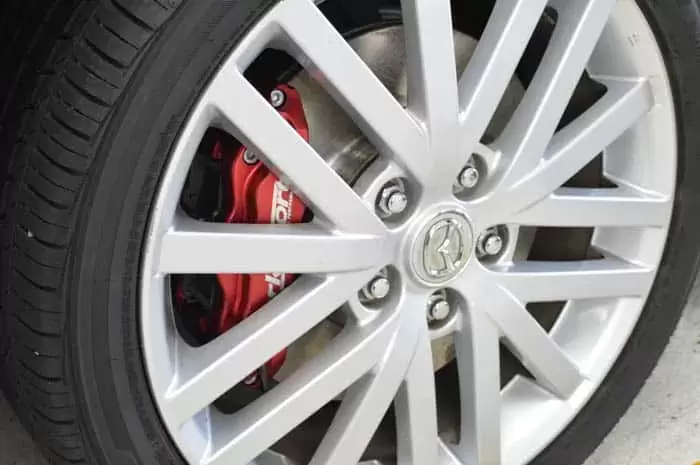 The big caliper kit can fit with the stock wheels if you use a 3mm or thicker spacer..