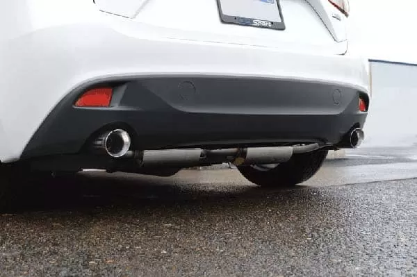 A rear-angled view of the cat-back exhaust from the driver's side.