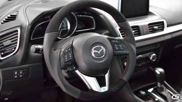 Upgrade the look of your interior with the Leather Wrapped Steering Wheel for the 2014-2016 Mazda 3, Cx5, and Cx3.