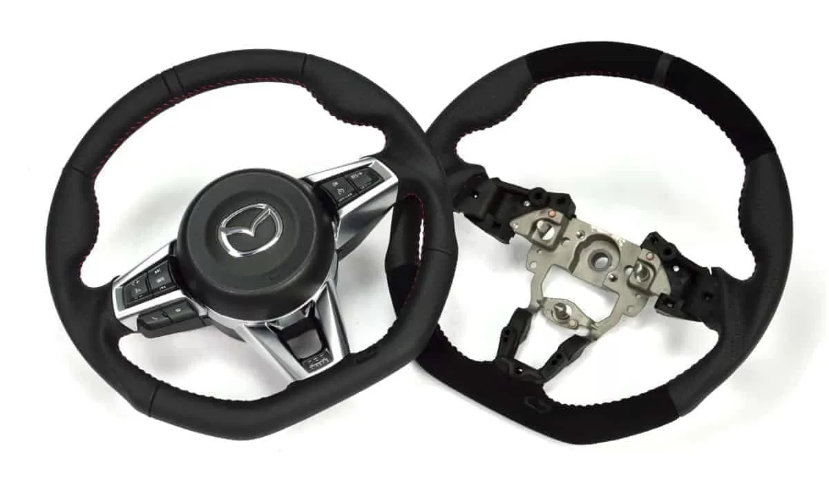 MX-5 Performance steering wheel. Choose from full leather or optional Alcantara inserts