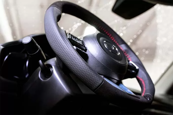 Classic style red stitching adds a touch of sportiness to the wheel and your interior.