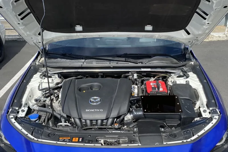 The CorkSport Mazda 3 Air Box enhances the look of your engine bay