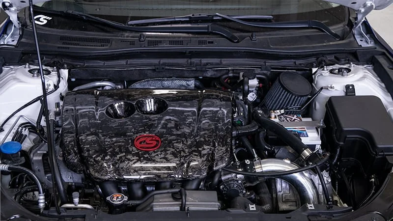 A clean and simple engine bay with the turbo kit installed