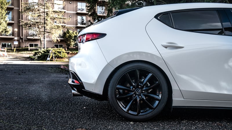 [BLEMISHED]  Larger dual wall tips complement the body lines of the Mazda 3 axel back