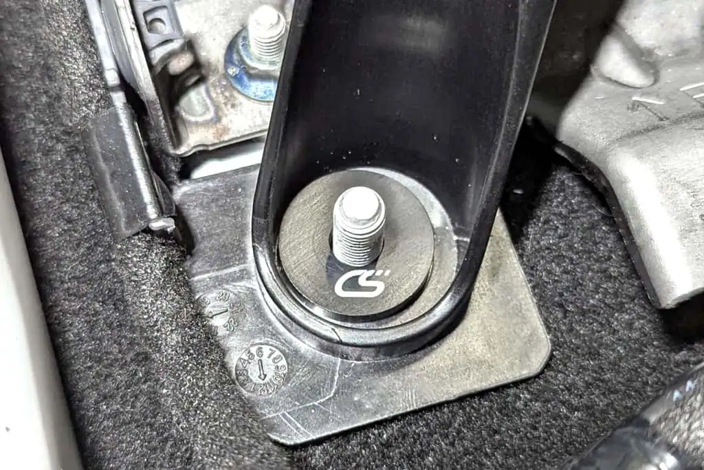 Replace OEM Shifter bushings with CorkSport bushings