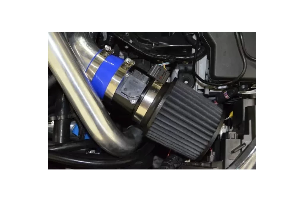 A close up view of the 3.5" intake system in the engine bay of a 2010-2013 Mazdaspeed 3.