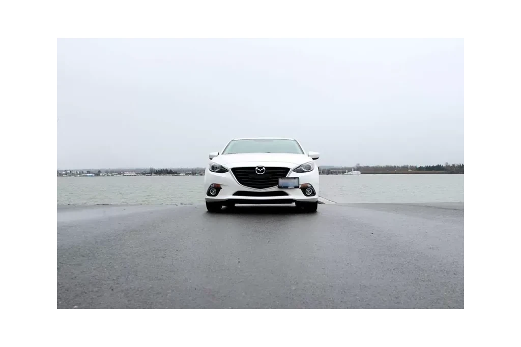 Unique styling allows you to not need to drill holes in your Mazda 3 bumper to mount a front plate