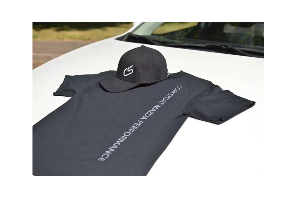 Our new 7th Gear membership program includes many perks, including this CorkSport branded hat and t-shirt.