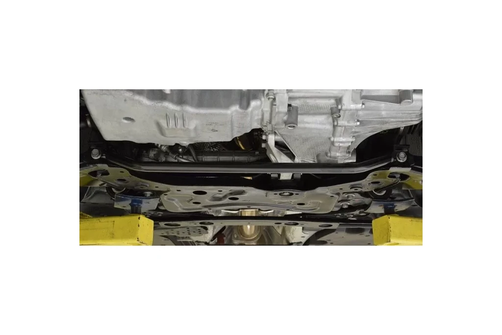 The Gen 1 and Gen 2 Mazdaspeed 3 Lower Tie Bar connects the inboard pivot points for the front lower control arms.