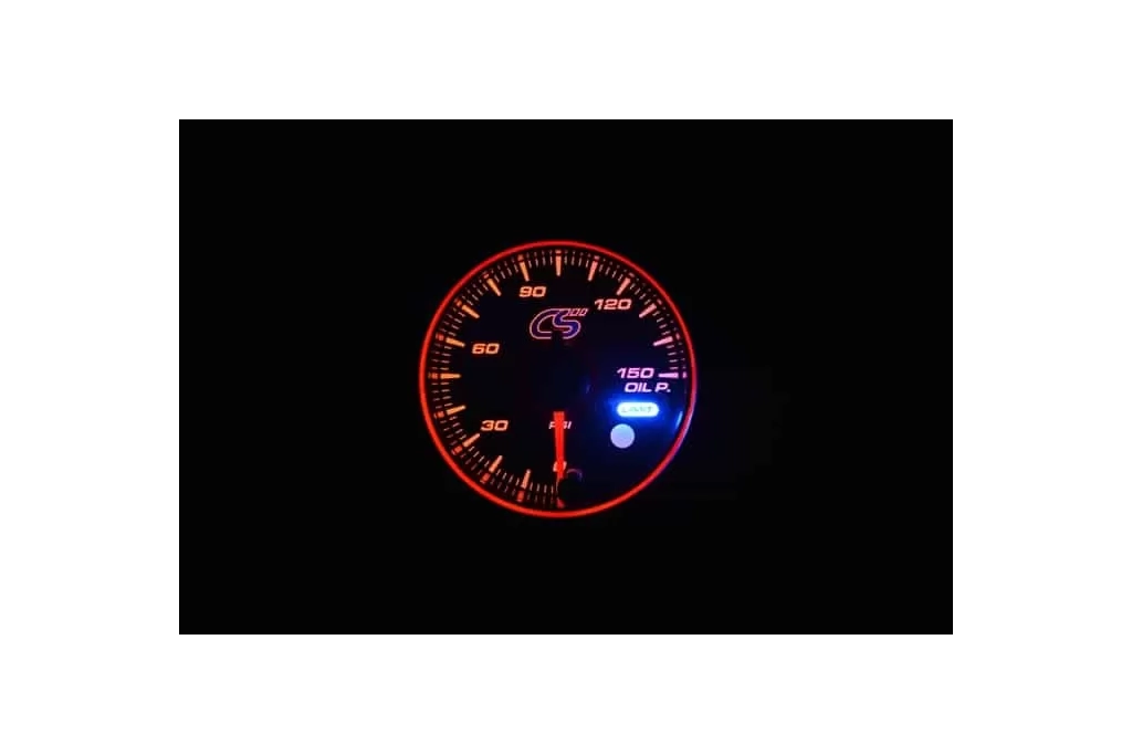 Orange face Mazdaspeed oil pressure gauge with warning.