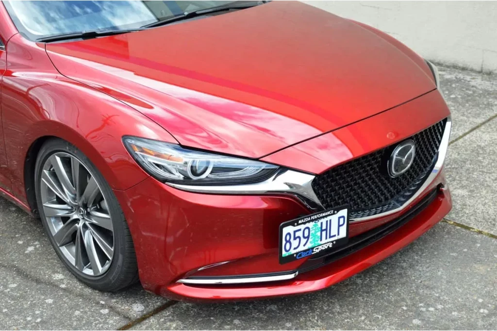 Mazda 6 license plate braket reloacation position on.