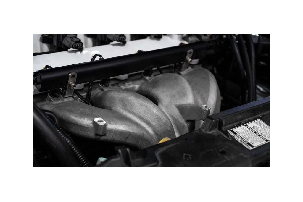 The intake manifold is manufactured from A356-T6 aluminum and post machined for OE fitment.