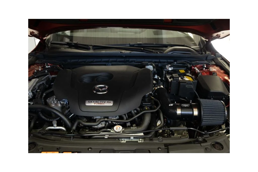 The all black shirt ram kit is sleek in the Mazda 3 engine bay