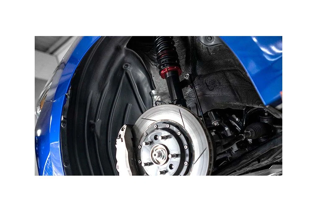 Adjustable front camber plates included to dial in wheel fitment & handling.