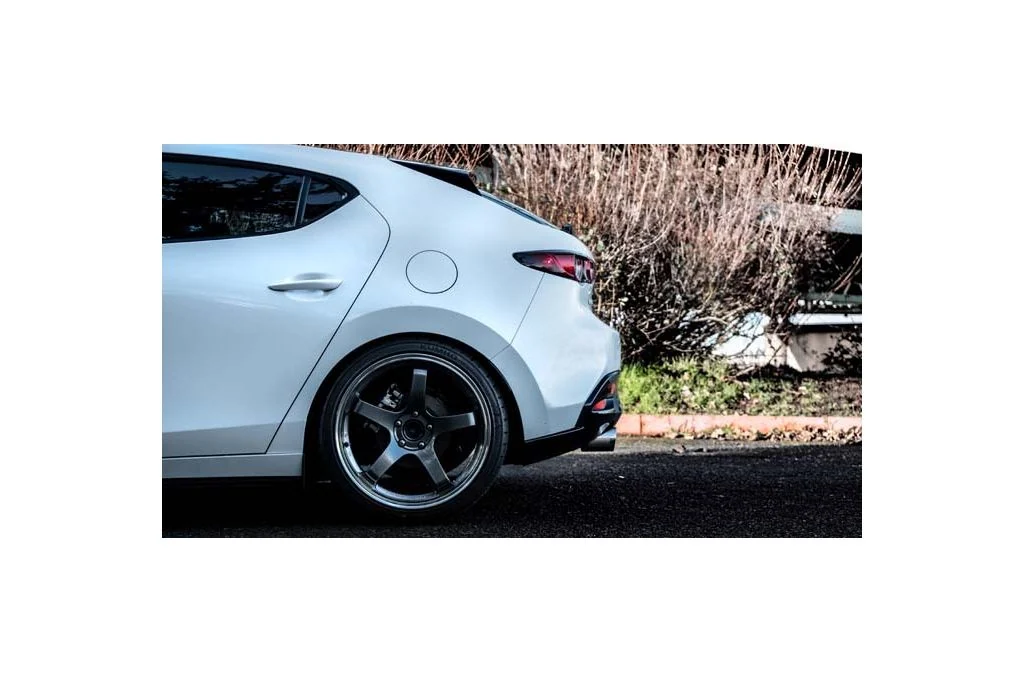 Larger dual wall tips complement the body lines of the Mazda 3 axel back