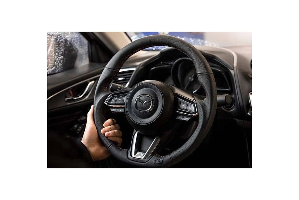 All OEM buttons and trim fit perfectly in the CorkSport Steering Wheel.