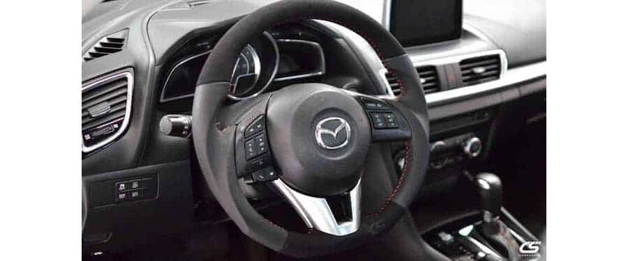 Upgrade the look of your interior with the Leather Wrapped Steering Wheel for the 2014-2016 Mazda 3, Cx5, and Cx3.