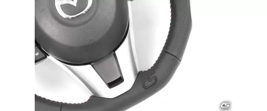 The Leather Mazda 3 Performance Steering Wheel uses high quality genuine leather to upgrade the look of you interior.