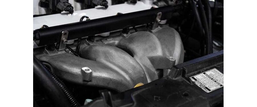 The intake manifold is manufactured from A356-T6 aluminum and post machined for OE fitment.