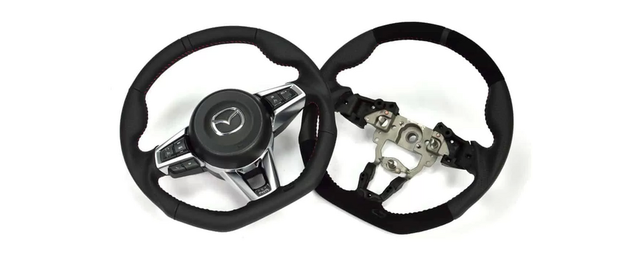 MX-5 Performance steering wheel. Choose from full leather or optional Alcantara inserts