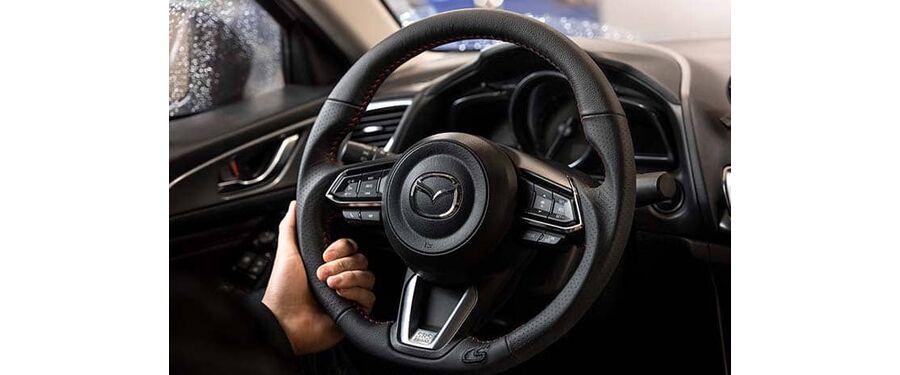All OEM buttons and trim fit perfectly in the CorkSport Steering Wheel.